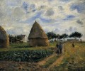 Los campesinos y los montones de heno 1878 Camille Pissarro
